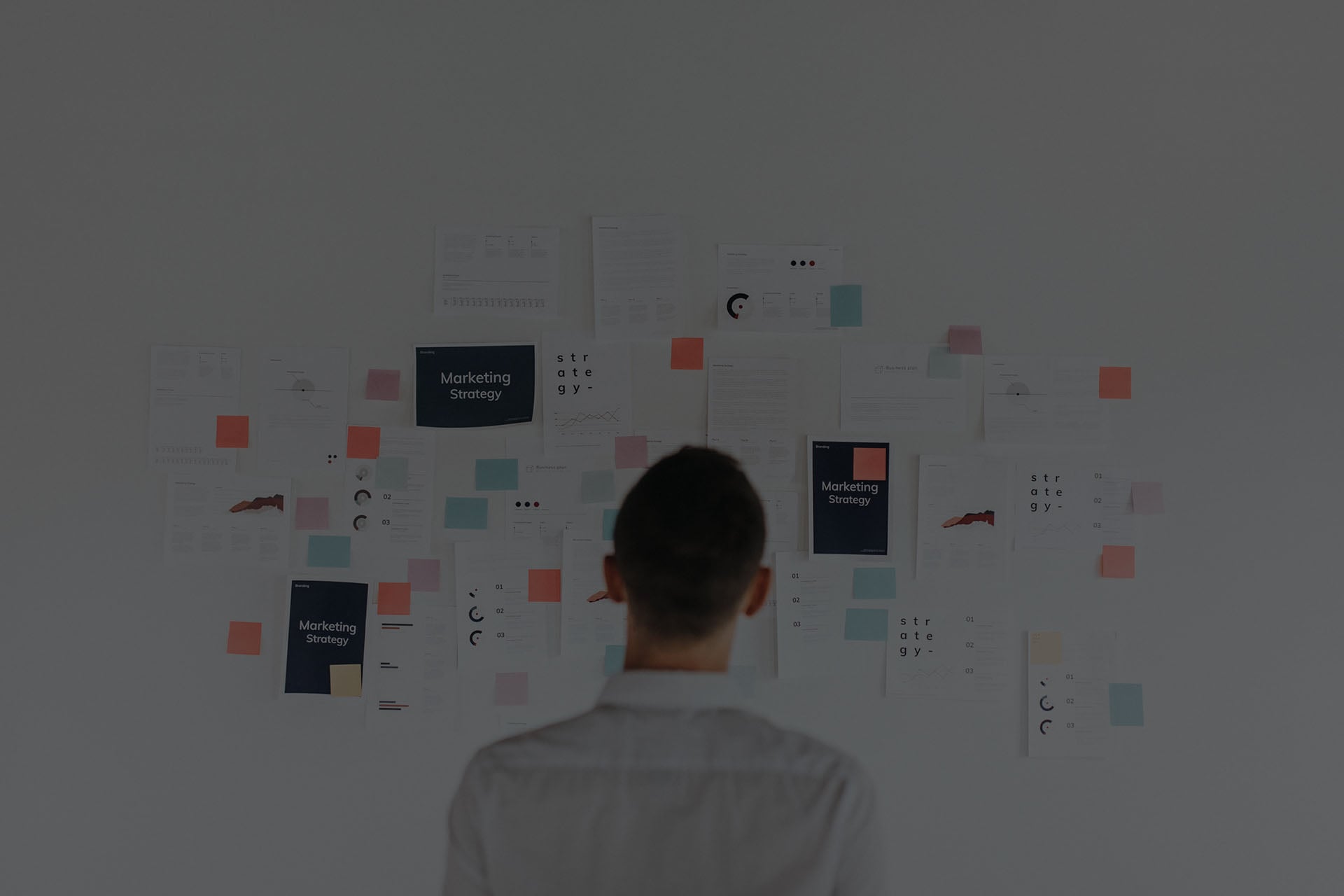 Man looking at a board